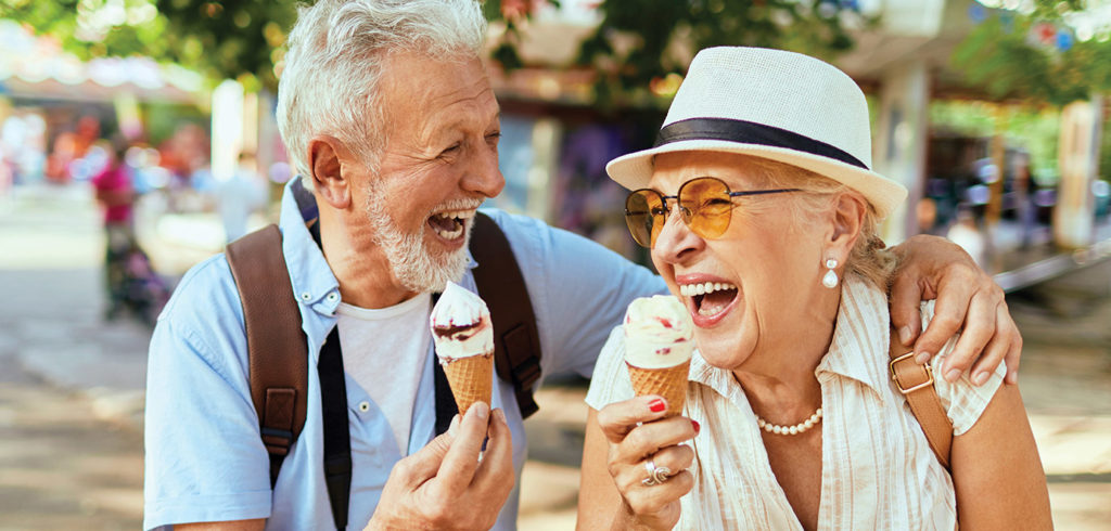 older couple eating ice cream cones